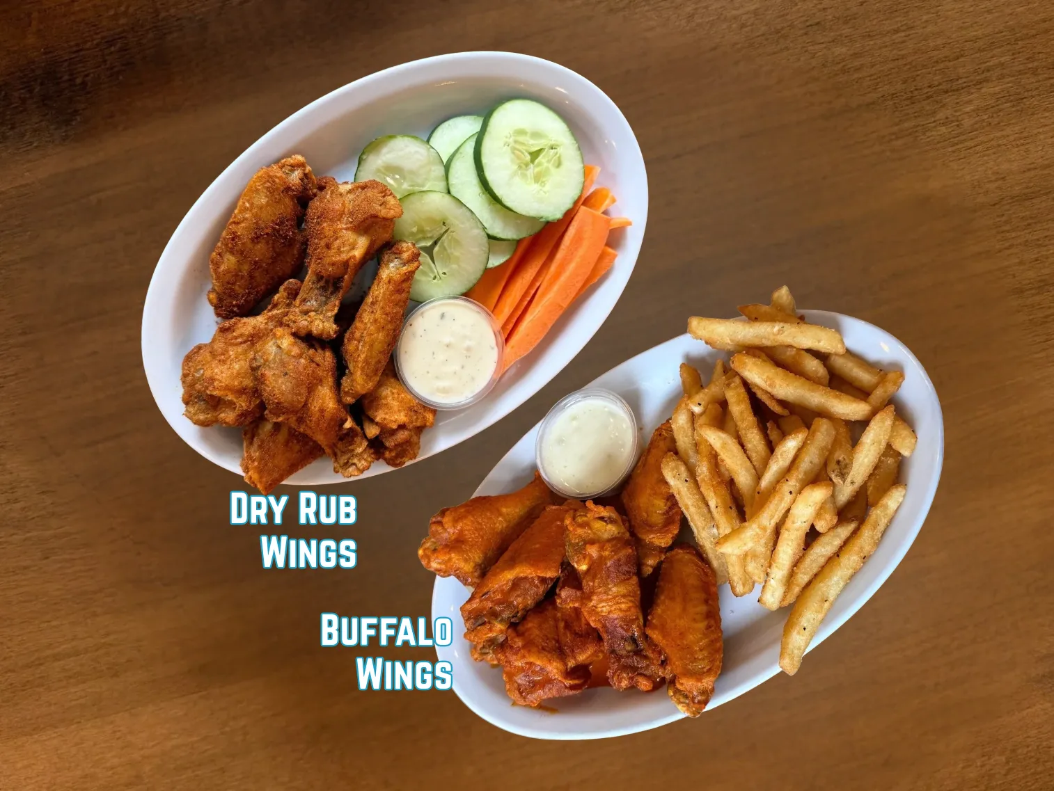 Dry rub wings with veggies and buffalo wings with fries and ranch.