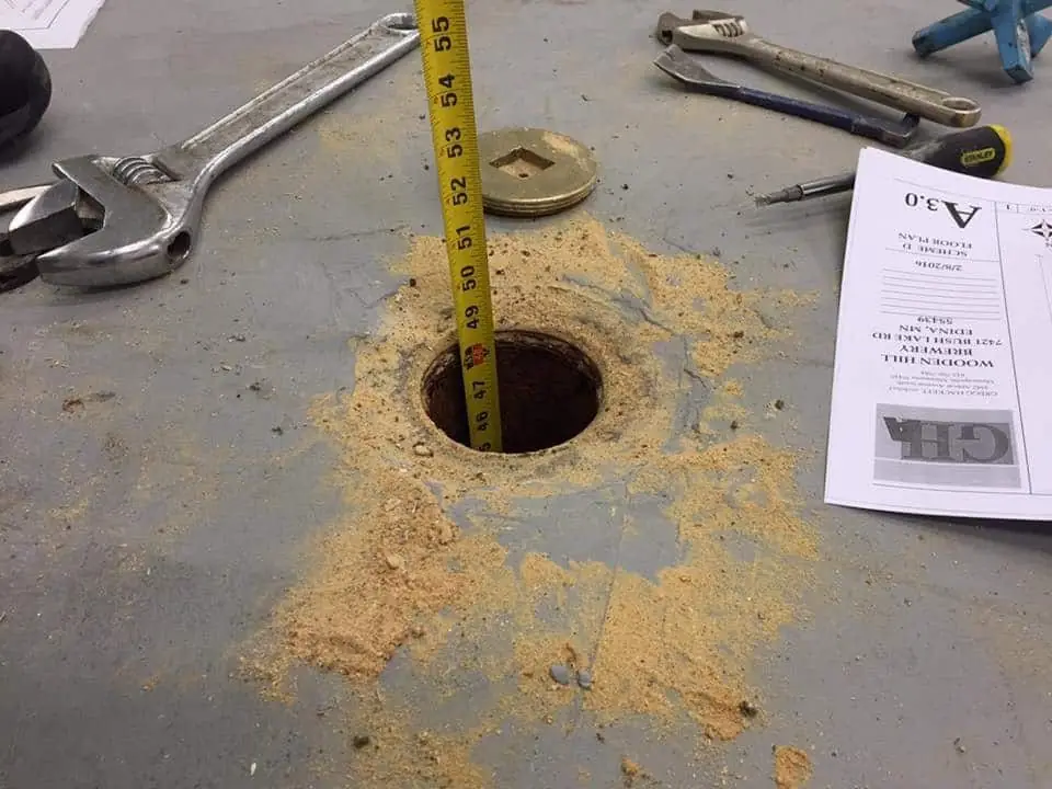 The main sewer drain in our space drops 4 feet before turning horizontal to run through the rest of the building. 