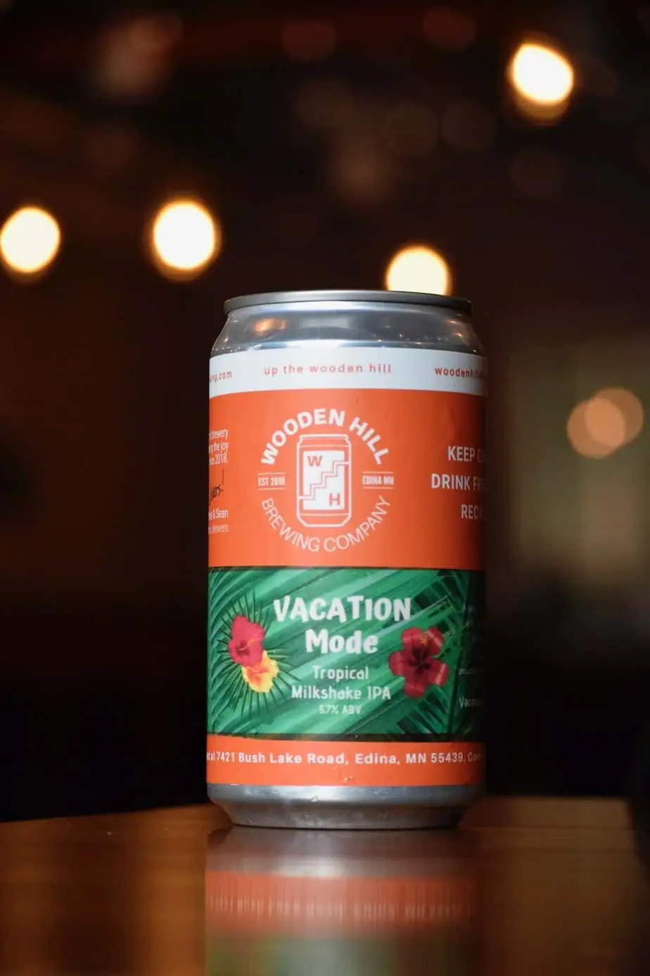 image of a crowler can of beer labeled "vacation mode"
