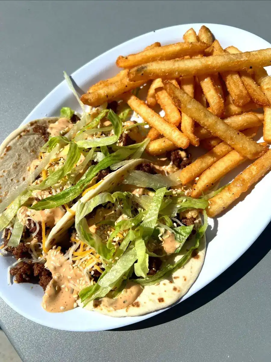 Picture of our taco special (McTaco) with fries on the side.