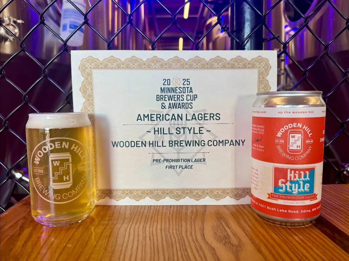 Picture showing our award certificate for Hill Style winning the Best American Lager. Picture shows the certificate, the glass of Hill Style and the beer can.