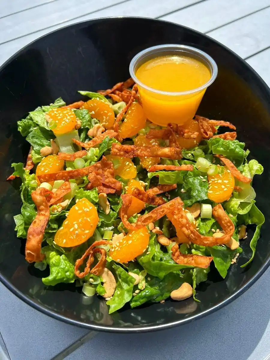 A picture of Mandarin crunch salad in a bowl.