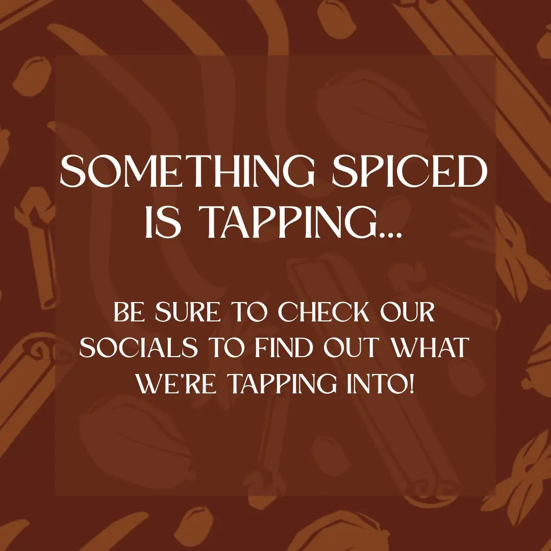 Beer teaser graphic that is brown and has cinnamon and nutmeg in the background. It says "something spiced is tapping... be sure to check our socials to find out what we're tapping into!"