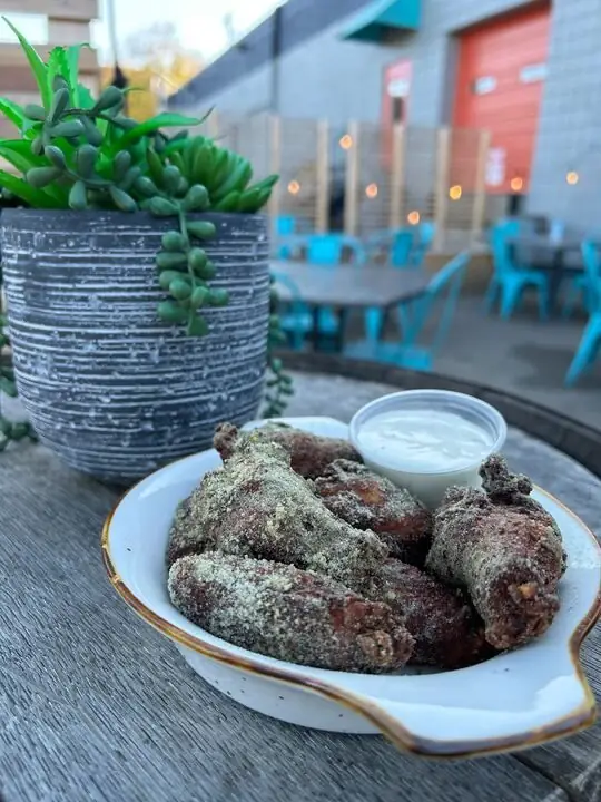 Photo of dry rub ranch wings with a side of ranch